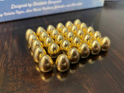 Flügelschlag Kombiset gesprenkelte Eier und goldene Eier aus Metall